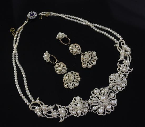 An early 19th century mother of pearl and seed pearl necklace with enamel and diamond set clasp and a pair of similar earrings.